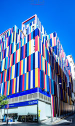 Low angle view of building against clear blue sky