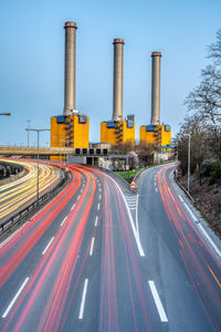 Highway and  power station at dusk seen in berlin, germany