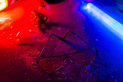 High angle view of wet glass on table