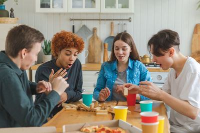 Portrait of family having food