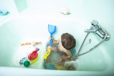 High angle view of toys in bathroom at home