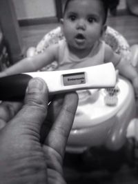 Close-up of man using mobile phone