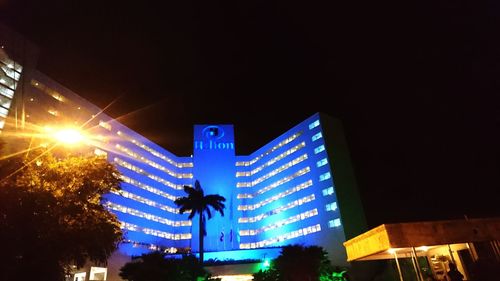 Low angle view of illuminated building at night