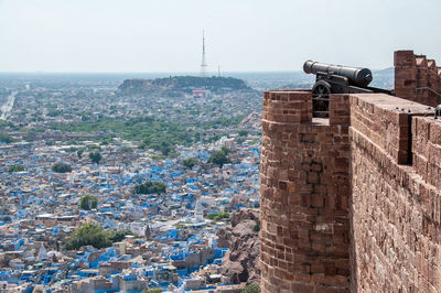Aerial view of city against sky
