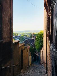 Alley amidst buildings in city