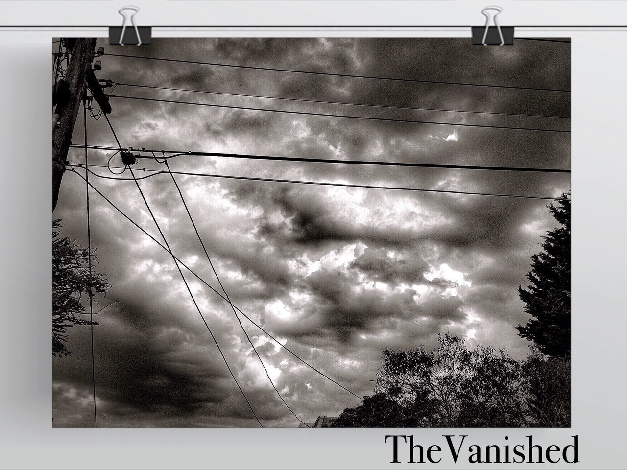 sky, cloud - sky, low angle view, cloudy, weather, power line, connection, overcast, cable, auto post production filter, transfer print, built structure, power supply, cloud, day, electricity pylon, architecture, transportation, electricity, outdoors