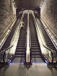 Low angle view of escalator in subway station