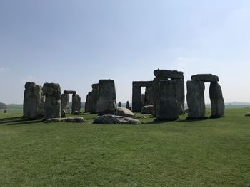 Stone wall on field against sky. stonehenge 