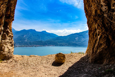 Scenic view of mountains against blue sky