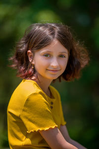 Portrait of smiling girl outdoors