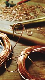 Close-up of metallic wire on table