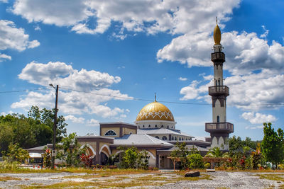 View of building against cloudy sky
