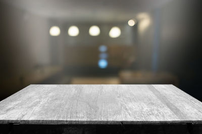 Close-up of illuminated lights on table
