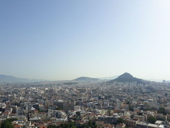 High angle shot of townscape against clear sky