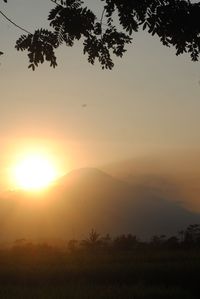 Scenic view of silhouette landscape against sky during sunset