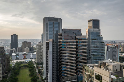 Modern buildings in city against sky