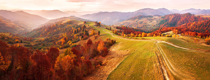 Scenic view of landscape against sky during autumn