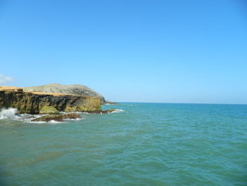 Scenic view of sea against clear sky