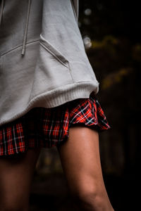 Rear view of woman standing outdoors