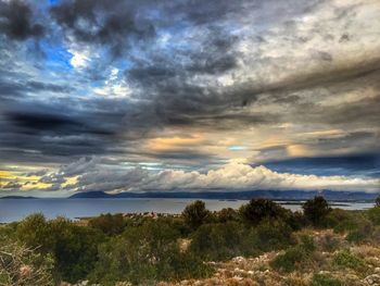 Scenic view of sea against dramatic sky