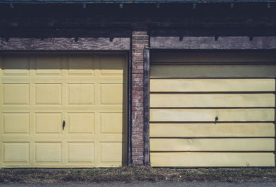 Closed yellow doors of garage