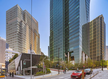 Low angle view of modern buildings against sky