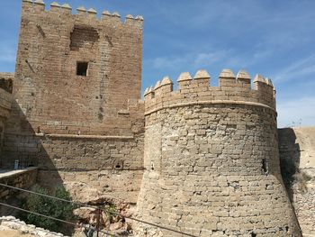 Low angle view of fort against sky