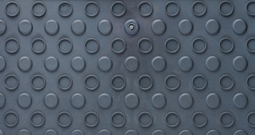 Abstract gray plastic texture with round bumps, full frame