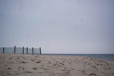 Scenic view of beach against clear sky