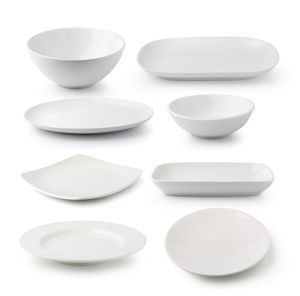 Close-up of crockery over white background