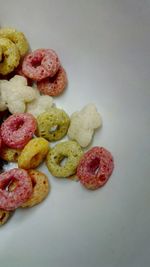 Close-up of cake against white background