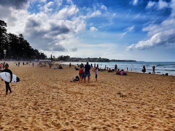 Tourists enjoying at beach