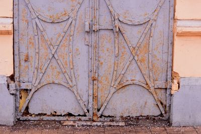 Close-up of old rusty metal door