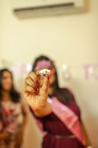 Portrait of woman hand with reflection