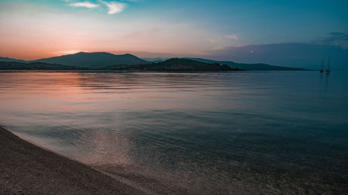 Scenic view of sea against sky during sunset