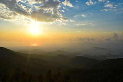 Scenic view of landscape against sky during sunset