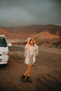 Woman standing on a desert