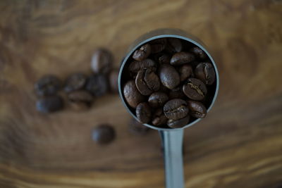 High angle view of coffee beans on table