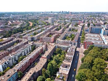 High angle view of street amidst buildings in city