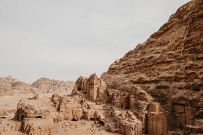 Rock formations in desert against sky