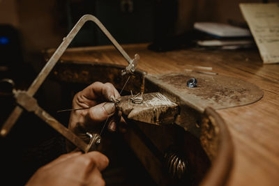 Close-up of person working on table