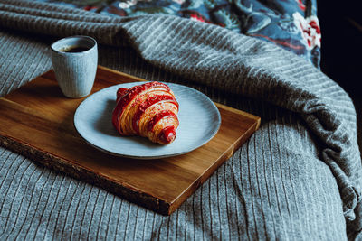 High angle view of breakfast on bed