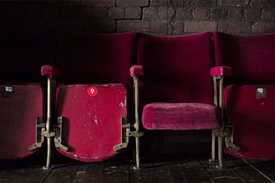 Empty chairs in a row