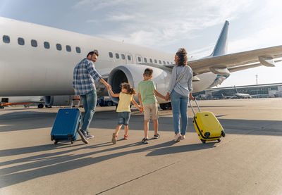 People on airport runway