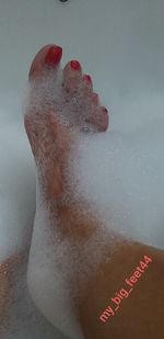 Close-up of woman in bathtub