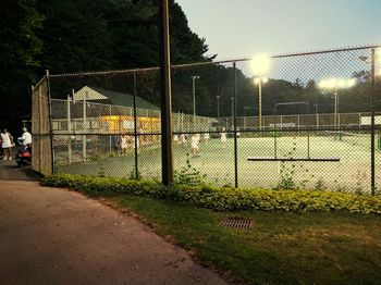 Chainlink fence at night