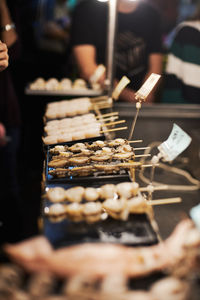 Baked mushrooms in night market in asia