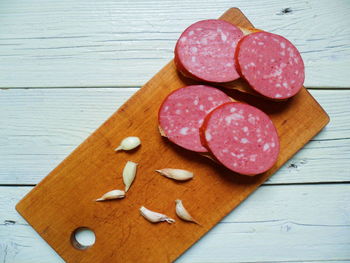 High angle view of bread on cutting board