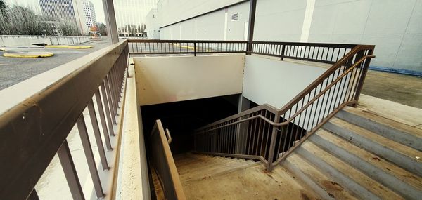 High angle view of empty staircase by building
