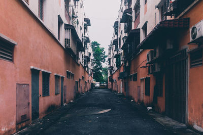 Narrow alley along buildings